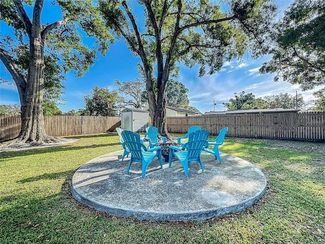 9616 Oak Ridge Ave, Riverview, FL 33578 - view of yard featuring a fenced backyard, an outbuilding, and a storage shed