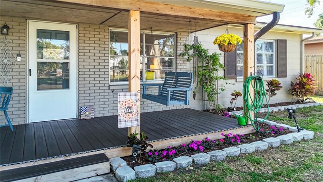 9616 Oak Ridge Ave, Riverview, FL 33578 - view of exterior entry featuring covered porch and brick siding