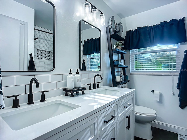 9616 Oak Ridge Ave, Riverview, FL 33578 - full bathroom with double vanity, tasteful backsplash, toilet, and a sink
