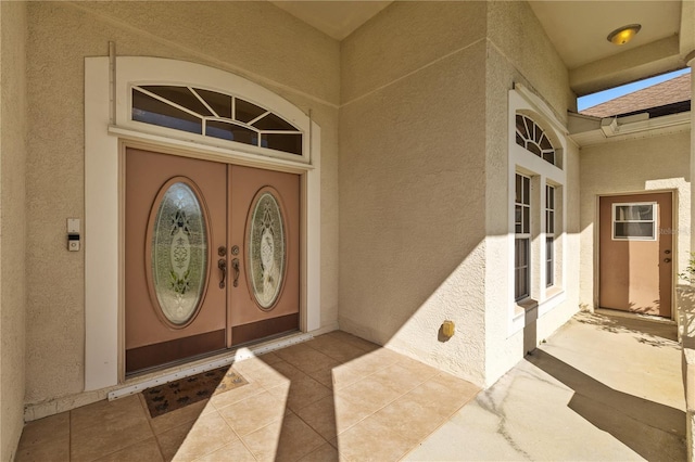 13750 Dowling Ln, Odessa, FL 33556 - doorway to property with stucco siding