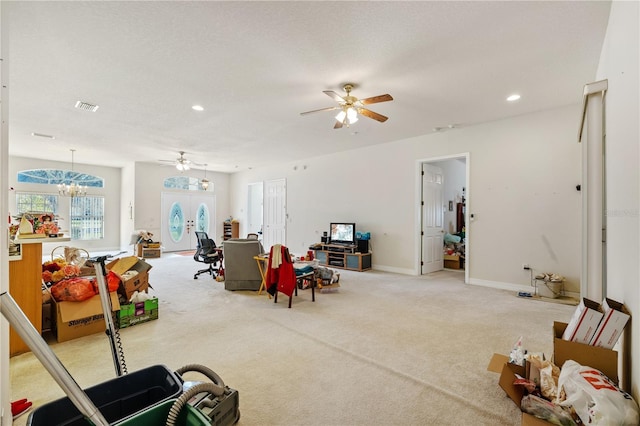 13750 Dowling Ln, Odessa, FL 33556 - living room with a ceiling fan, carpet, recessed lighting, baseboards, and a chandelier