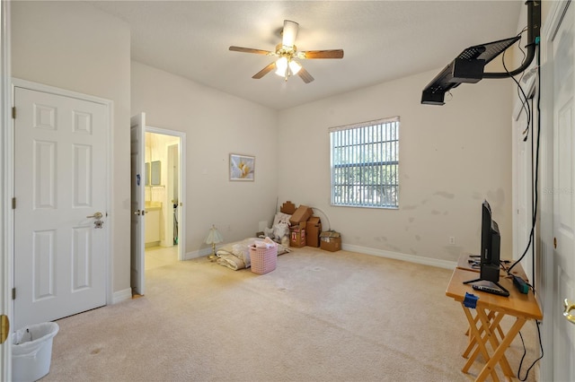 13750 Dowling Ln, Odessa, FL 33556 - unfurnished bedroom featuring light colored carpet, baseboards, a ceiling fan, and connected bathroom