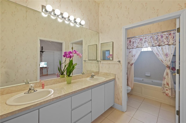 13750 Dowling Ln, Odessa, FL 33556 - full bathroom with tile patterned floors, toilet, double vanity, wallpapered walls, and shower / bathtub combination with curtain