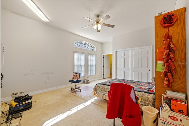 13750 Dowling Ln, Odessa, FL 33556 - bedroom with carpet floors, baseboards, a closet, and a ceiling fan