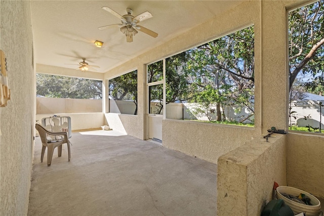 13750 Dowling Ln, Odessa, FL 33556 - sunroom featuring ceiling fan