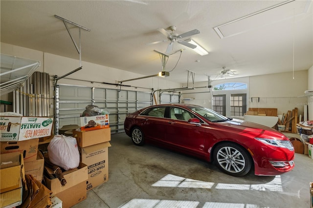 13750 Dowling Ln, Odessa, FL 33556 - garage with a ceiling fan and a garage door opener