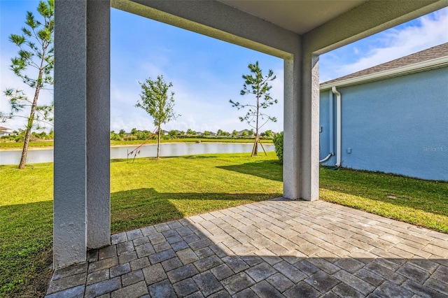 7334 Ashcroft Dr, Wesley Chapel, FL 33545 - view of patio with a water view