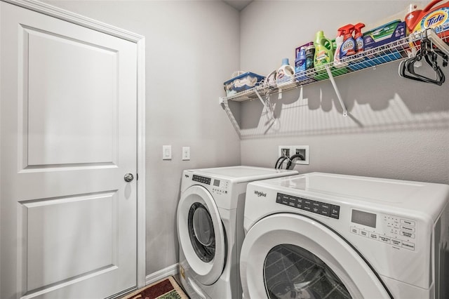 7334 Ashcroft Dr, Wesley Chapel, FL 33545 - washroom featuring washing machine and clothes dryer and laundry area