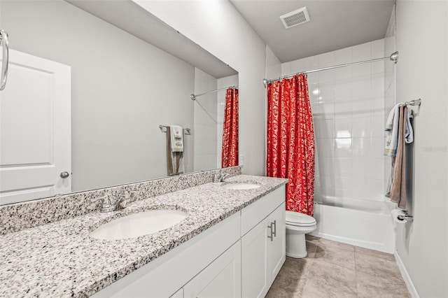 7334 Ashcroft Dr, Wesley Chapel, FL 33545 - full bathroom with toilet, a sink, visible vents, shower / bath combination with curtain, and double vanity