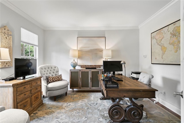 office space with baseboards, ornamental molding, and wood finished floors