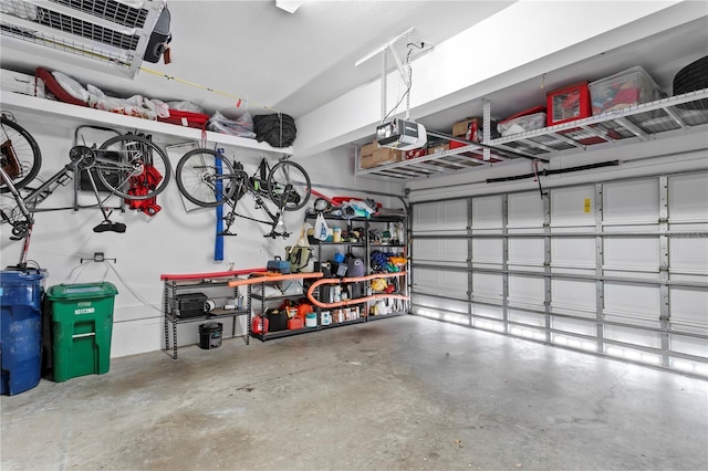 garage featuring a garage door opener