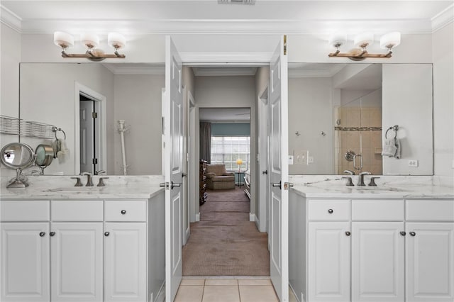 full bath featuring crown molding, a sink, and a stall shower