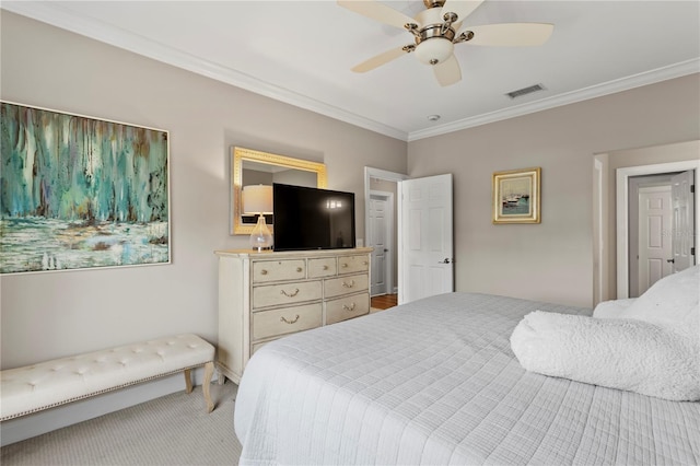 bedroom featuring crown molding, light colored carpet, a ceiling fan, and visible vents