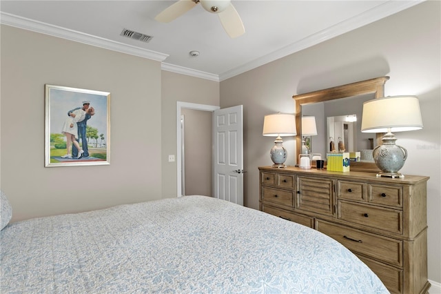 bedroom featuring crown molding, visible vents, and a ceiling fan