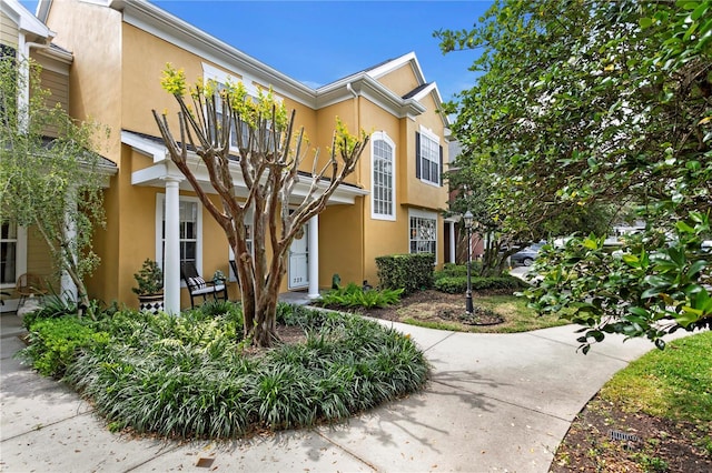 townhome / multi-family property with stucco siding