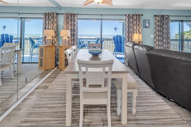 200 120th Ave W Unit 3A, Treasure Island, FL 33706 - dining space featuring wood finished floors and ceiling fan