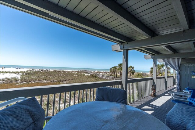 200 120th Ave W Unit 3A, Treasure Island, FL 33706 - balcony featuring view of water and beach and outdoor dining space