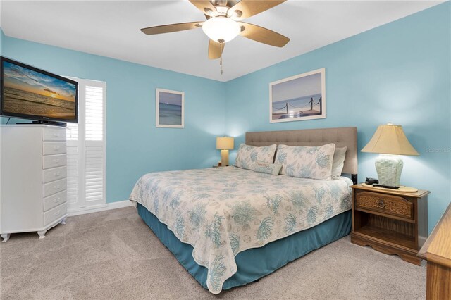 200 120th Ave W Unit 3A, Treasure Island, FL 33706 - bedroom with carpet floors, baseboards, and ceiling fan
