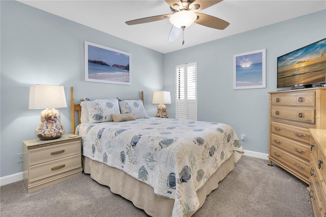 200 120th Ave W Unit 3A, Treasure Island, FL 33706 - bedroom with light colored carpet, baseboards, and ceiling fan