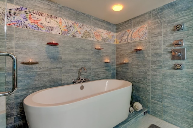 80 Rogers St Unit 2A, Clearwater, FL 33756 - full bathroom with a soaking tub and tile walls