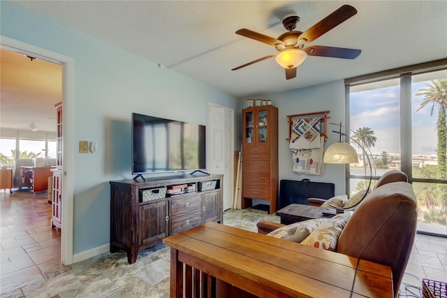 80 Rogers St Unit 2A, Clearwater, FL 33756 - living area featuring baseboards and ceiling fan
