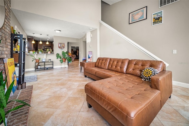 8135 Settlers Landing Trl N, Jacksonville, FL 32244 - living area featuring baseboards, visible vents, and light tile patterned flooring