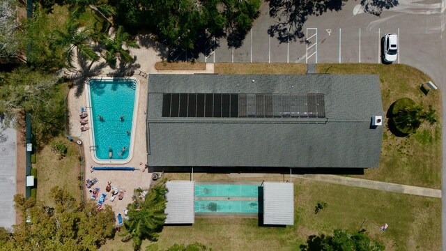 100 Glennes Ln Unit 207, Dunedin, FL 34698 - view from above of property with a pool