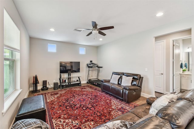 4007 W Gray St, Tampa, FL 33609 - living area with recessed lighting, wood finished floors, a ceiling fan, and baseboards