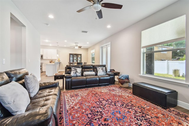 4007 W Gray St, Tampa, FL 33609 - living area with baseboards, a ceiling fan, and recessed lighting