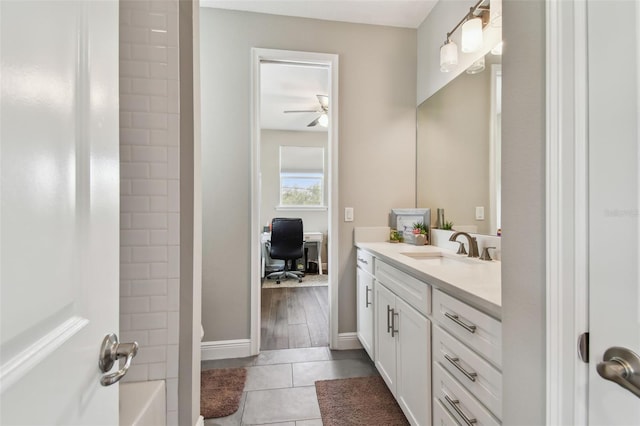 4007 W Gray St, Tampa, FL 33609 - bathroom featuring tile patterned floors, bathing tub / shower combination, baseboards, ceiling fan, and vanity