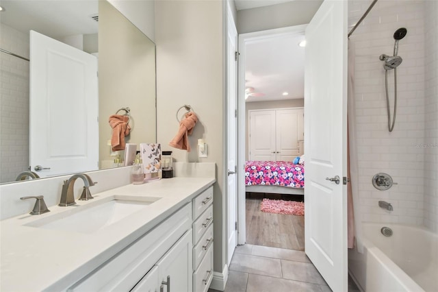 4007 W Gray St, Tampa, FL 33609 - ensuite bathroom featuring recessed lighting, tile patterned flooring, shower / washtub combination, vanity, and ensuite bathroom