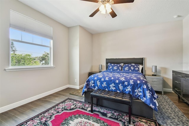 4007 W Gray St, Tampa, FL 33609 - bedroom with ceiling fan, baseboards, and wood finished floors