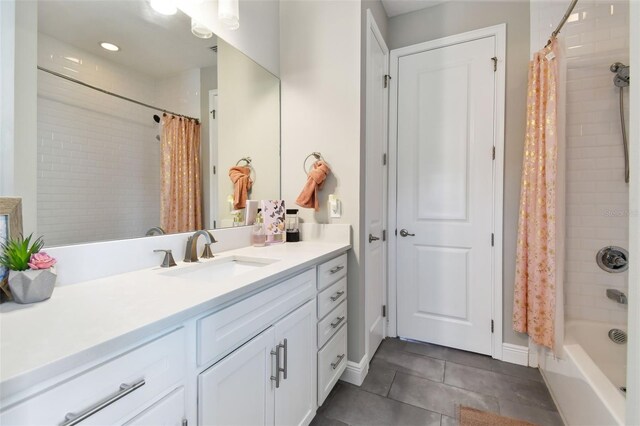 4007 W Gray St, Tampa, FL 33609 - bathroom featuring baseboards, shower / tub combo, tile patterned flooring, and vanity