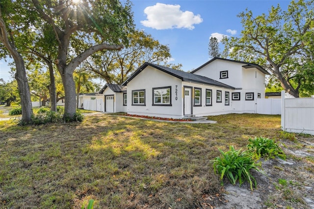 7210 8th Ave N, Saint Petersburg, FL 33710 - rear view of property with stucco siding