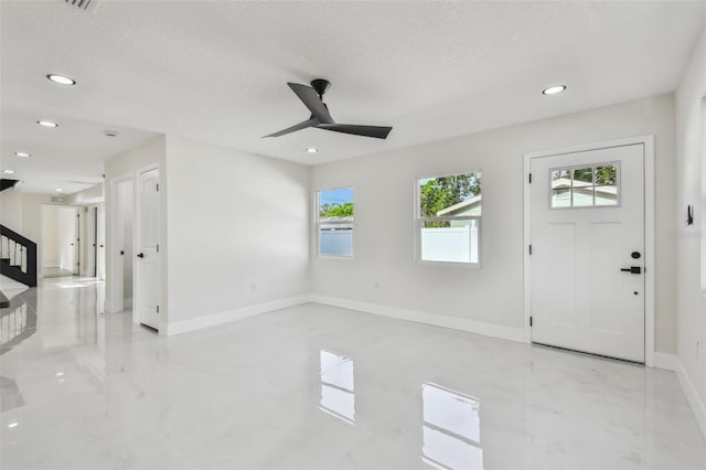 7210 8th Ave N, Saint Petersburg, FL 33710 - entryway featuring a ceiling fan, recessed lighting, and stairs