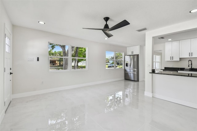 7210 8th Ave N, Saint Petersburg, FL 33710 - unfurnished living room featuring recessed lighting and ceiling fan