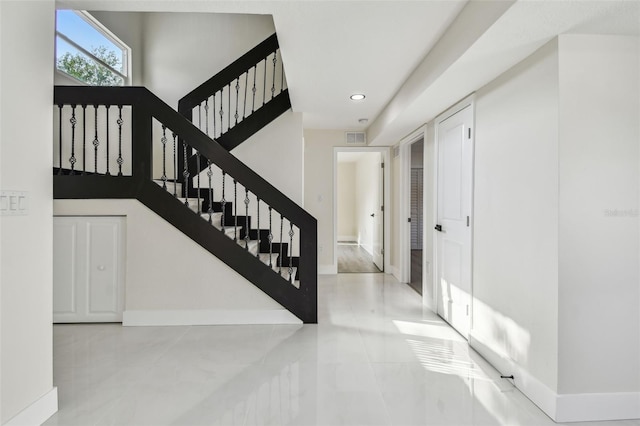 7210 8th Ave N, Saint Petersburg, FL 33710 - staircase featuring recessed lighting and tile patterned flooring