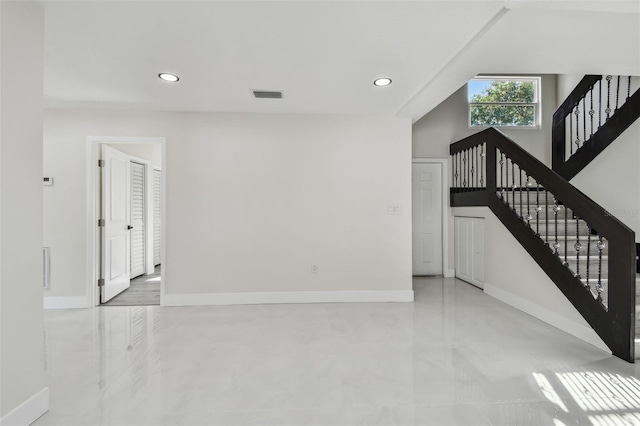 7210 8th Ave N, Saint Petersburg, FL 33710 - unfurnished living room featuring recessed lighting and stairway