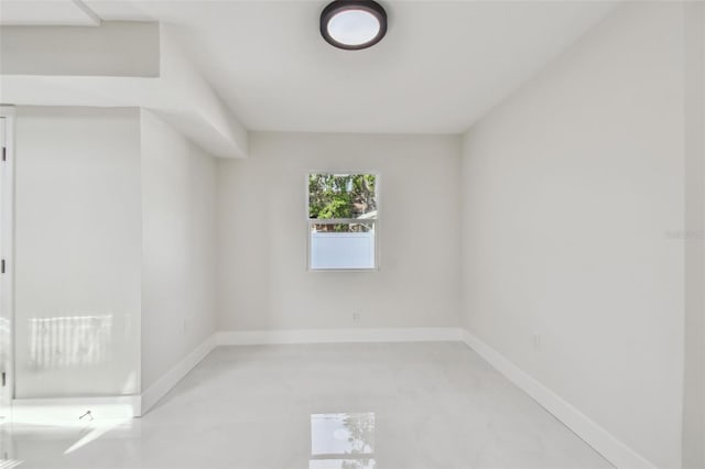 7210 8th Ave N, Saint Petersburg, FL 33710 - spare room featuring baseboards