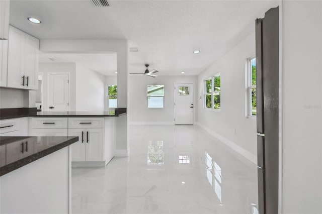 7210 8th Ave N, Saint Petersburg, FL 33710 - kitchen featuring white cabinetry, a ceiling fan, and recessed lighting