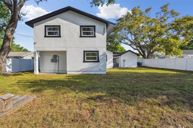 7210 8th Ave N, Saint Petersburg, FL 33710 - back of property featuring stucco siding