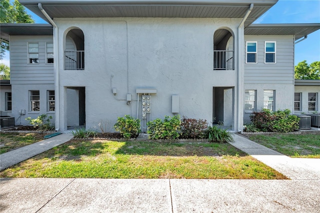 multi unit property featuring central AC and stucco siding