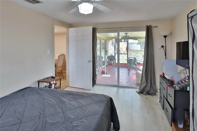 bedroom with light wood finished floors, visible vents, ceiling fan, and access to outside