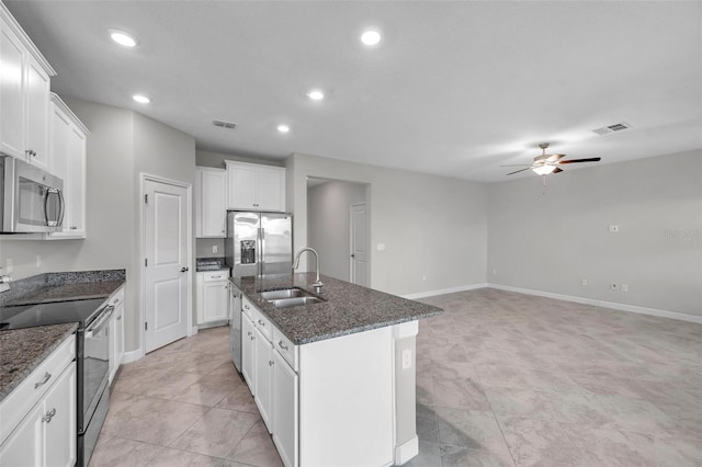 kitchen with appliances with stainless steel finishes, recessed lighting, visible vents, ceiling fan, and a sink