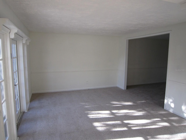 4118 Dellbrook Dr, Tampa, FL 33624 - carpeted empty room featuring baseboards