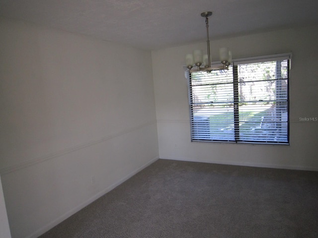 4118 Dellbrook Dr, Tampa, FL 33624 - carpeted spare room featuring a notable chandelier