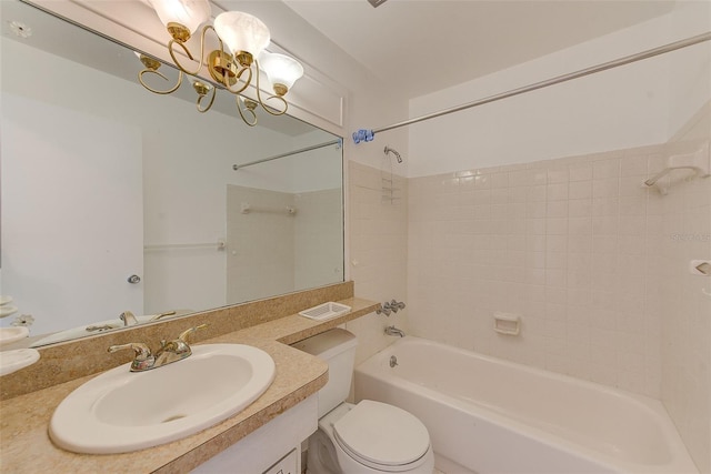 full bath with shower / tub combination, toilet, vanity, and a chandelier