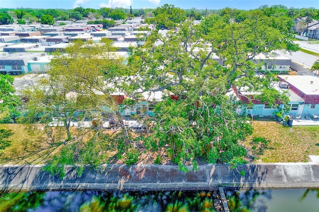 bird's eye view with a residential view and a water view