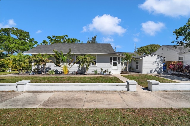 705 28th St N, Saint Petersburg, FL 33713 - view of front of home featuring a front lawn