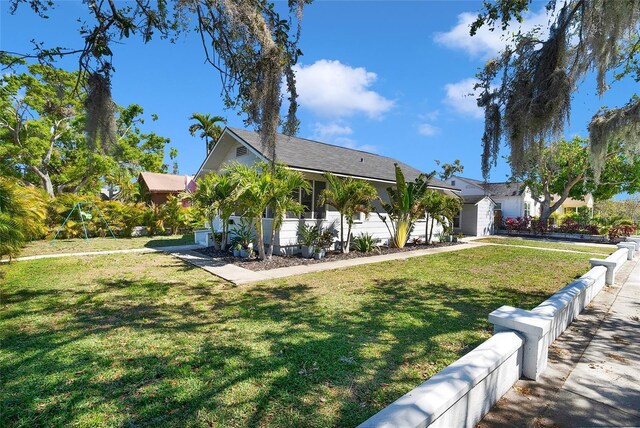 705 28th St N, Saint Petersburg, FL 33713 - exterior space featuring a front lawn